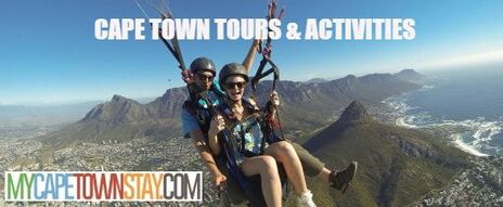 Tandem paragliding off Signal Hill